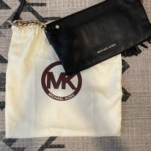 Michael Kors Black and Gold leather shoulder bag.
